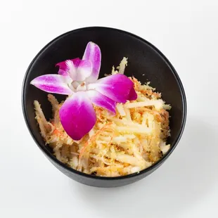 Signature sushi rolls, poke bowls, ramen, and creative spring rolls.