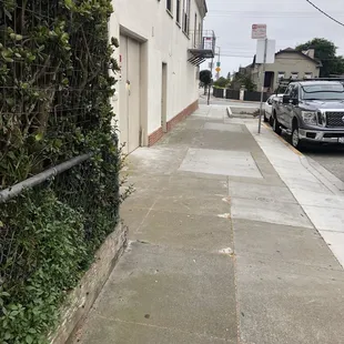 Cool Guys Market up to the left and turn left.