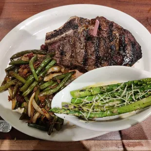 Outlaw ribeye with green beans and grilled asparagus