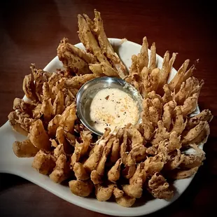 a platter of fried onion rings