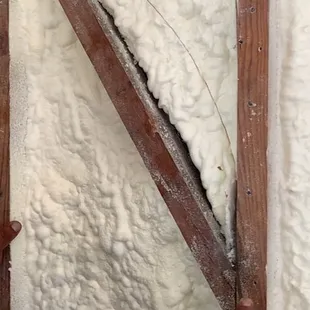 foam is shrinking and no longer air sealing. Water vapor can pass through this space and cause moisture to collect in the wall cavity.