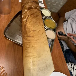 a giant crepe on a table