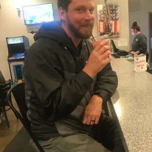 Caught "Sketch" catching a refreshing frozen Christmas  beverage . He said he's "ready to go" but he looks  content.