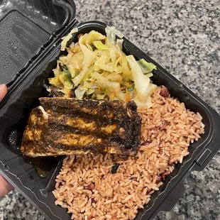 a meal in a styrofoam container