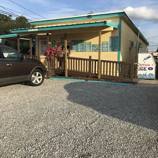 a car parked in front of a mobile home