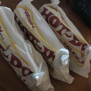 Three chili-cheese dogs!