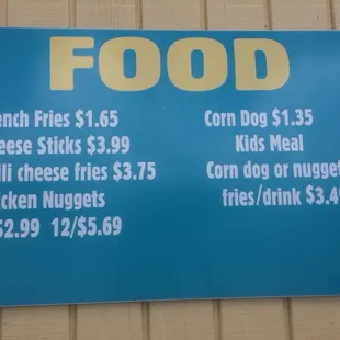 a blue sign with a price of food on it