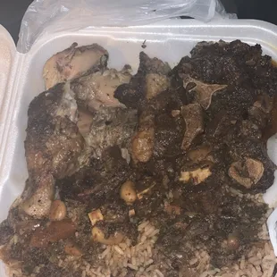 Oxtail and jerk chicken combo