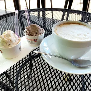 two cups of gelato and a spoon