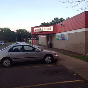 a car parked in front of a store