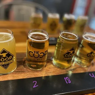 a flight of beer glasses
