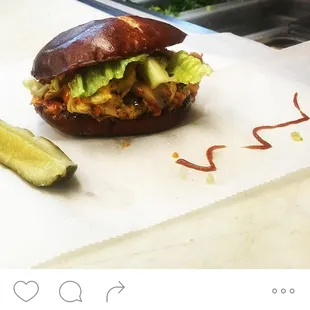 a sandwich with pickles and a pickle