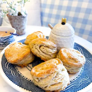a plate of scones and a cup of tea