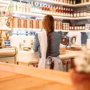 a woman in a kitchen