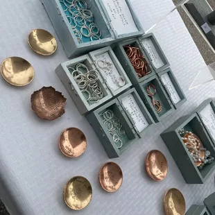 a display of copper jewelry
