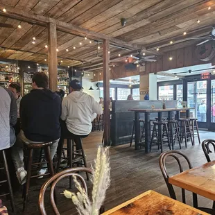 people sitting at the bar