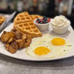 waffles and eggs on a plate