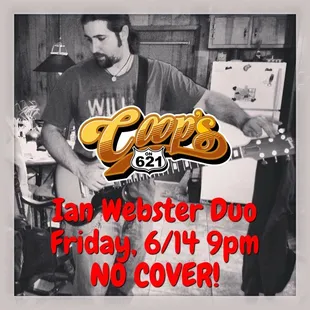 a man playing a guitar