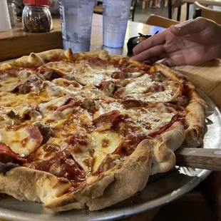 Meat Eater Pizza. So good. Good service. Cool vibes. Been going here since I was a kid.