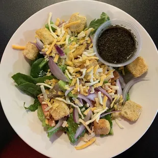 Side salad with Greek vinaigrette.