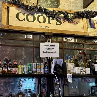 a bar with bottles of alcohol