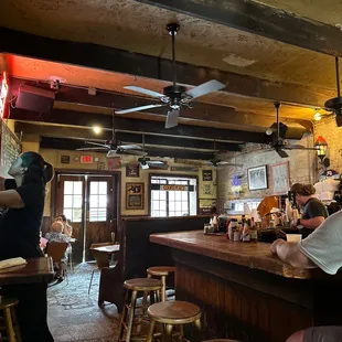 people sitting at the bar