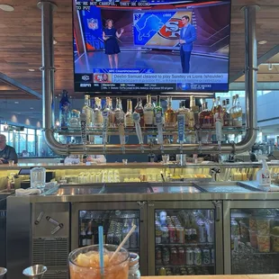 a television and a drink