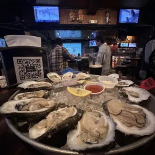 A dozen oysters and TVs