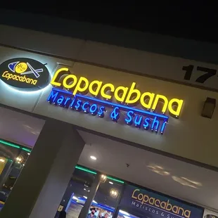 the front of a restaurant at night