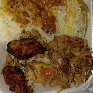 Barbacoa with yello rice and red beans. Awesome. Have had the pork and chicken and pastelles and all were awesome