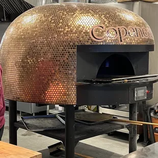 Copper-topped pizza oven
