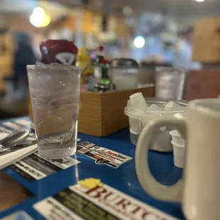 a glass of water and a plate of food