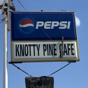 a sign for knotty pine cafe