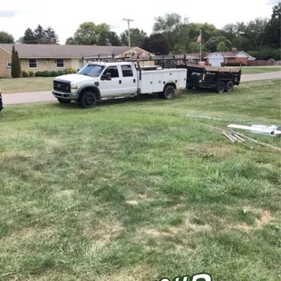 a truck parked in a field