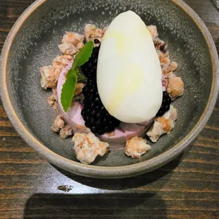 Blackberry mousse with anise ice cream and granola.