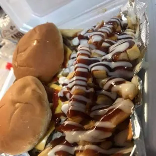 &quot;THE BURGER SPECIAL&quot; with &quot;HONEY RAIN FRIES&quot;
2 Cheeseburgers &amp; fries for $8
Add honey rain sauce for $1 more