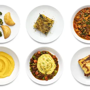 a variety of different dishes of food