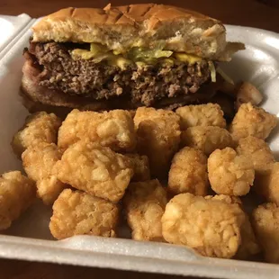 Bacon Cheeseburger with mustard, pickles, and onions along with and a side of tots. Great Burger !!! Huge Patty !!!