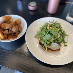 Avocado toast (no smoked trout) and a side of potatoes