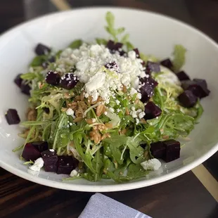 Beet Salad with goat cheese, arugula and nuts.