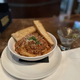 Pappardelle  Bolognese with a dirty martini so goooood