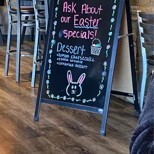 a chalkboard sign for a restaurant