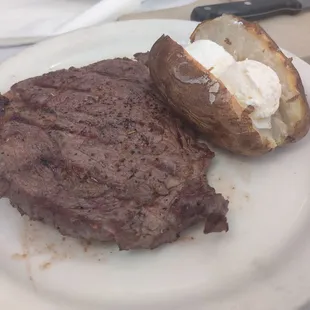 10 ounce rib eye with baked potato