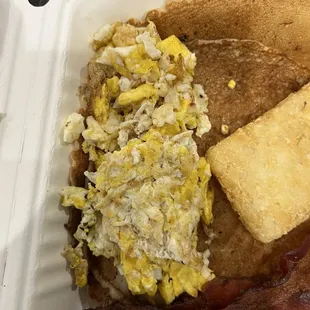 bacon, eggs, hash browns and toast