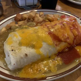 My carne breakfast burrito....a real monster Huge and amazing...full of carne and both the green and red were delicious!!   I ate it all!