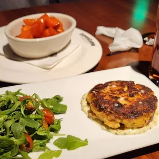 Salmon cake appetizer and a side of carrots