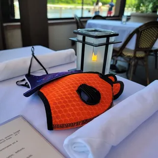 masks, candle, lake view