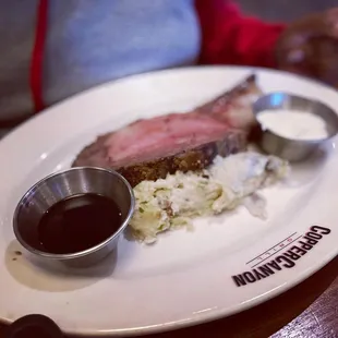 a plate of meat and rice