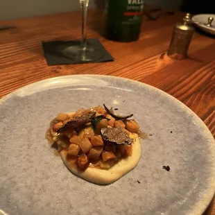 Black truffle Ravioli dish