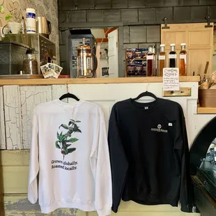 two sweatshirts on display